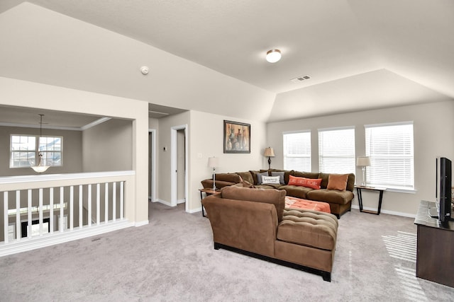 living room featuring vaulted ceiling and light colored carpet