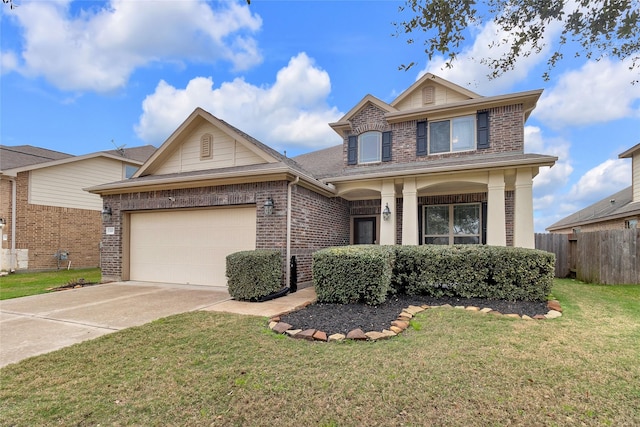 view of front of home featuring a garage and a front lawn