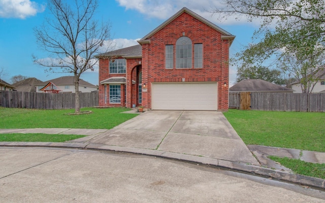 front facade featuring a garage and a front yard