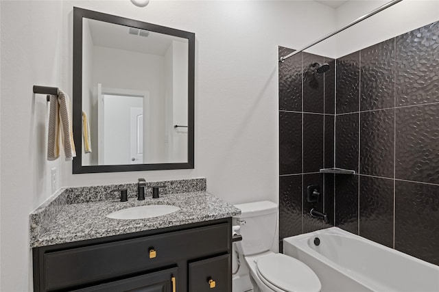 bathroom with toilet, visible vents, shower / washtub combination, and vanity