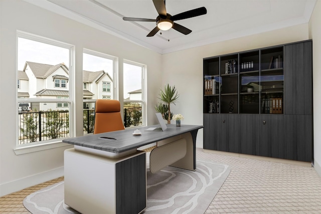 home office with crown molding, plenty of natural light, and ceiling fan