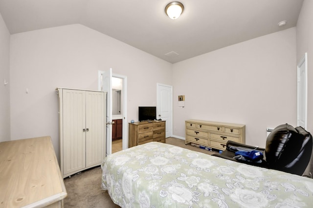 carpeted bedroom featuring vaulted ceiling