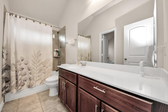 full bathroom featuring toilet, vaulted ceiling, vanity, shower / bath combo, and tile patterned flooring