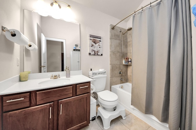 full bathroom featuring vanity, tile patterned floors, shower / bath combo with shower curtain, and toilet