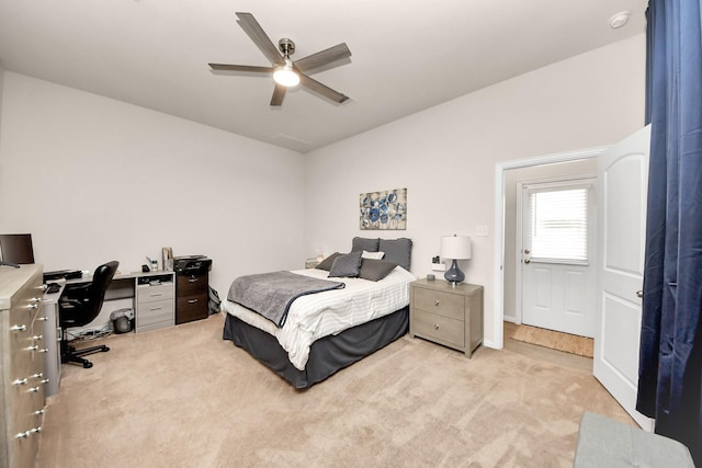 bedroom with light carpet and ceiling fan