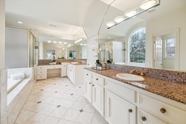 bathroom with vanity, separate shower and tub, and tile patterned flooring