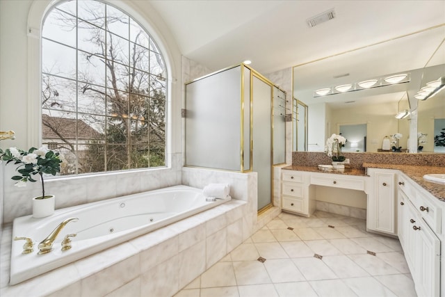 bathroom featuring vanity and plus walk in shower