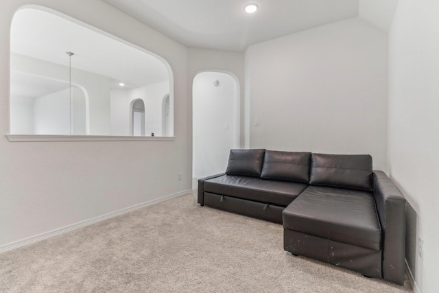 living room featuring light colored carpet