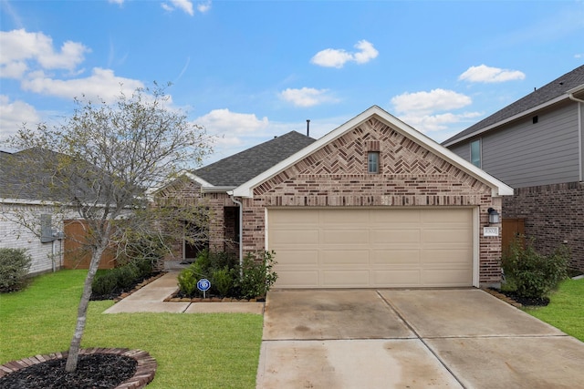 view of front facade with a garage and a front yard