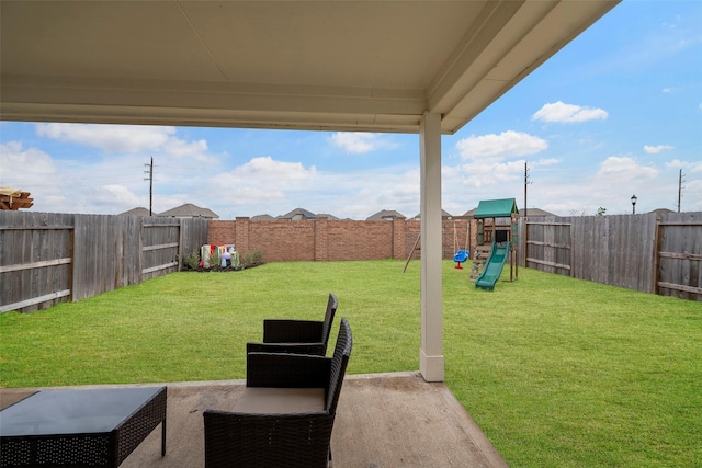 view of yard with a playground