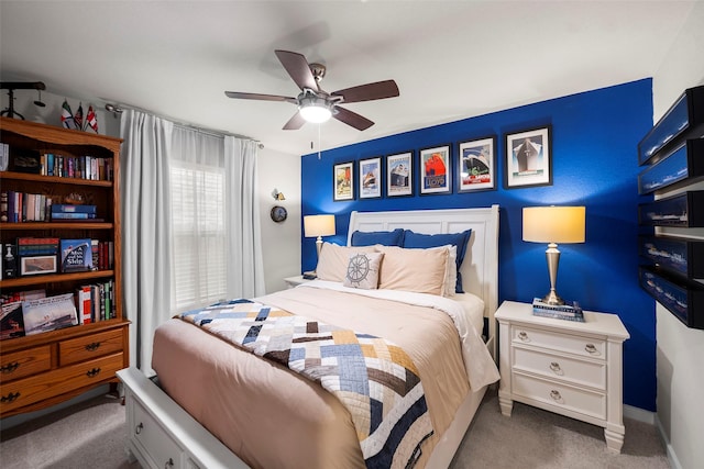 bedroom with ceiling fan and carpet flooring