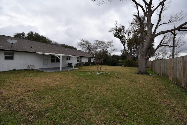 view of yard with a patio area