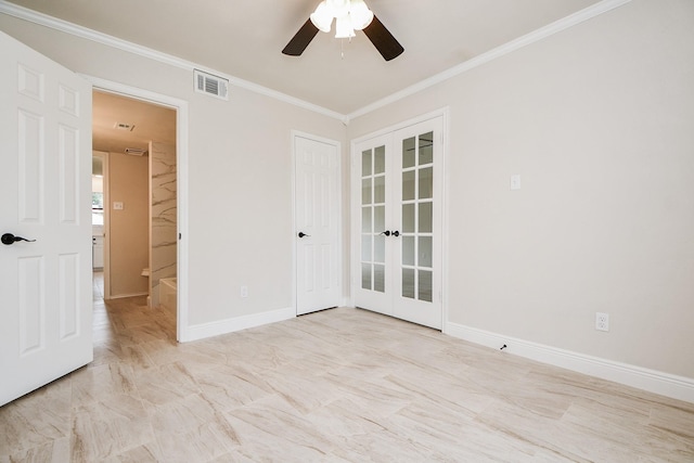 unfurnished room with crown molding, ceiling fan, and french doors