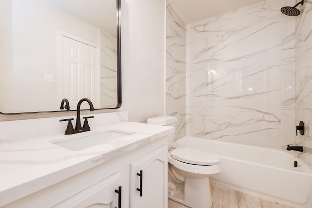 full bathroom with vanity, toilet, and tiled shower / bath