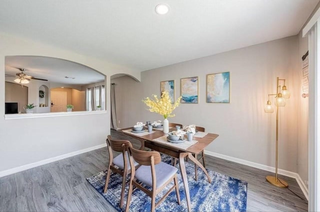 dining area with wood-type flooring