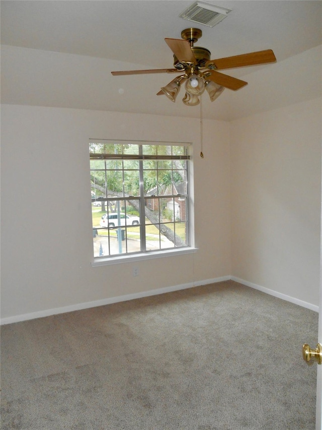 unfurnished room featuring carpet flooring