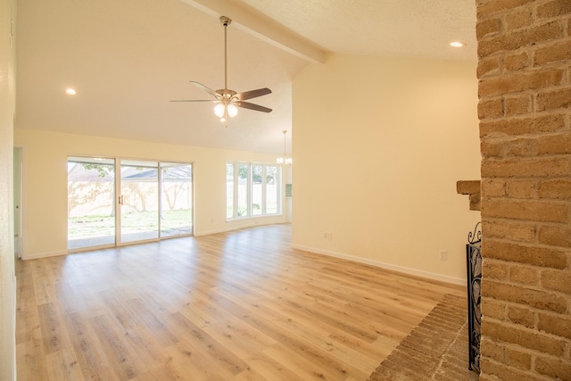 unfurnished living room with beamed ceiling, ceiling fan, high vaulted ceiling, and light hardwood / wood-style floors