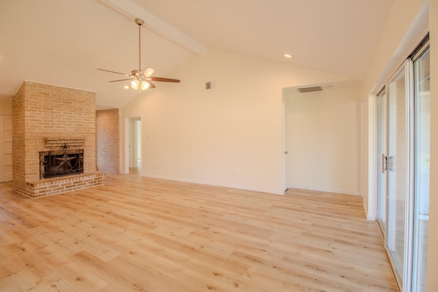 unfurnished living room with high vaulted ceiling, a fireplace, beamed ceiling, ceiling fan, and light hardwood / wood-style floors