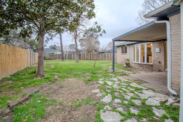 view of yard with a patio area