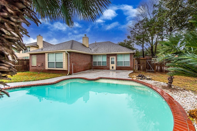 view of pool featuring a patio area