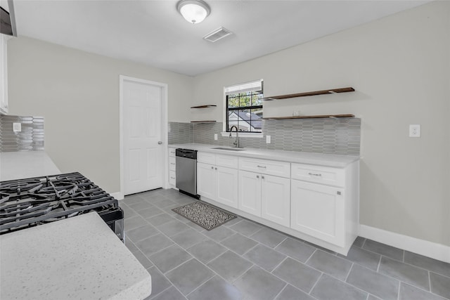 kitchen with white cabinetry, dishwasher, sink, decorative backsplash, and gas range