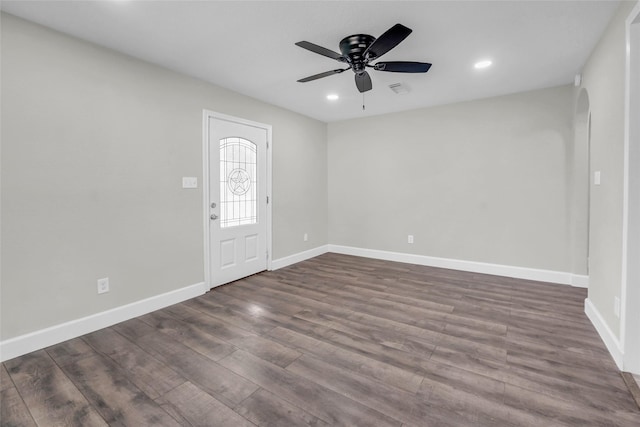 foyer featuring dark wood-type flooring and ceiling fan