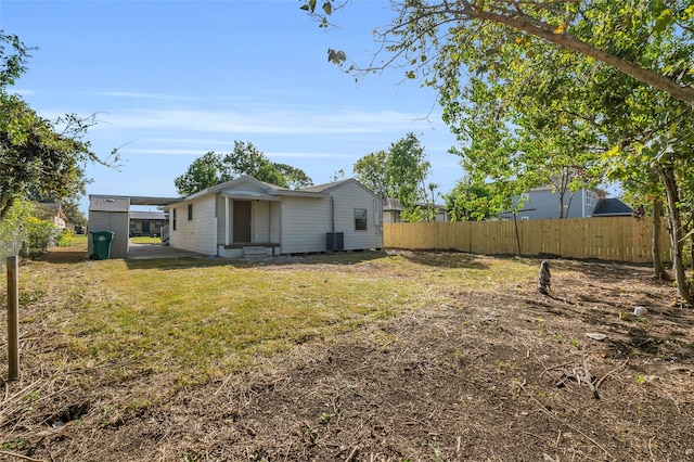 view of yard featuring central air condition unit