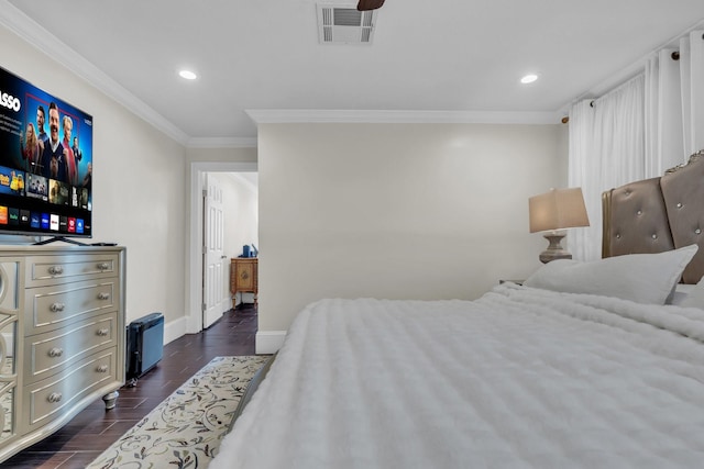 bedroom featuring crown molding