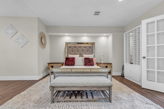 bedroom featuring dark wood-type flooring