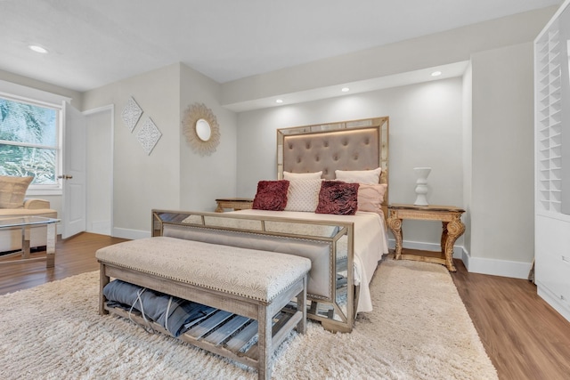 bedroom featuring wood-type flooring