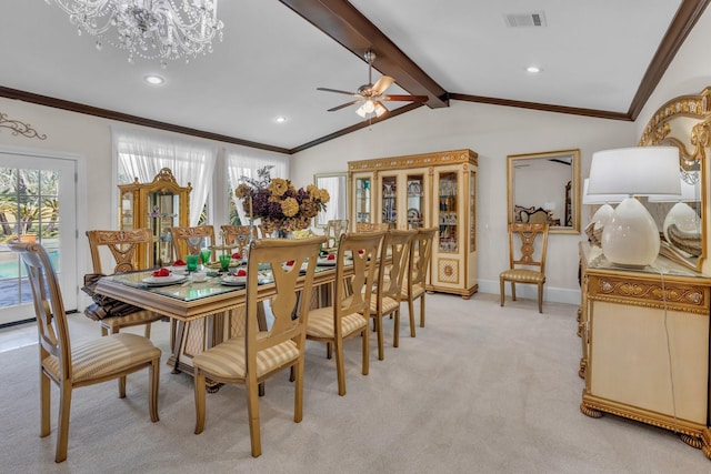 carpeted dining space featuring lofted ceiling with beams, crown molding, and ceiling fan with notable chandelier