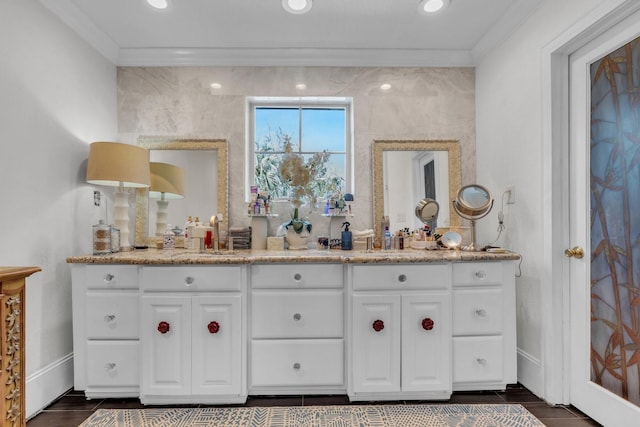 interior space with ornamental molding and vanity