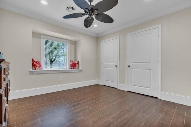 unfurnished bedroom featuring ceiling fan and ornamental molding