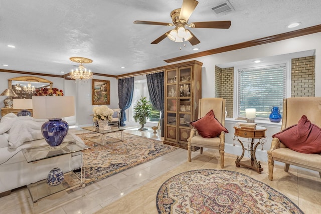 living room featuring crown molding, ceiling fan with notable chandelier, and a textured ceiling