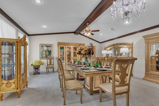 carpeted dining space with ornamental molding, lofted ceiling with beams, and ceiling fan