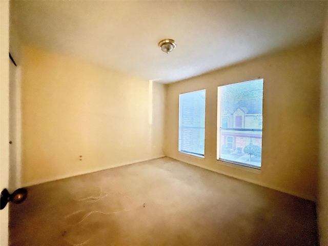 view of carpeted spare room