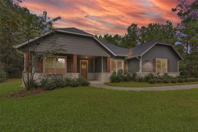 view of front of home featuring a yard