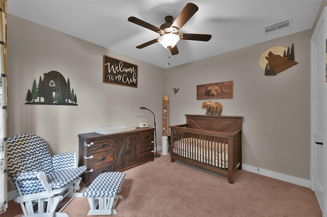 carpeted bedroom featuring ceiling fan