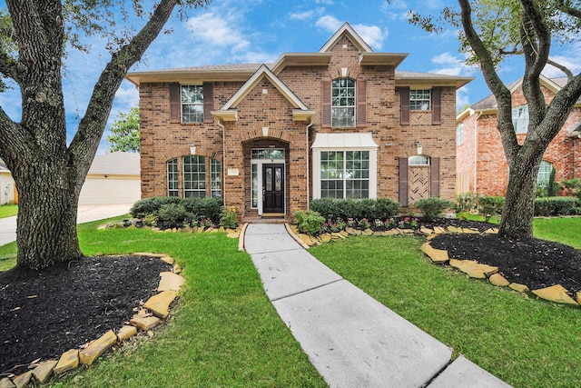 view of front of home featuring a front yard