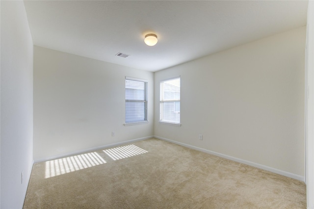 view of carpeted spare room