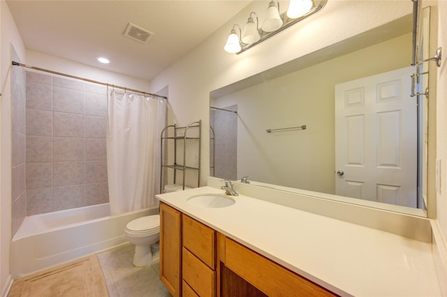 full bathroom featuring vanity, shower / tub combo, tile patterned floors, and toilet