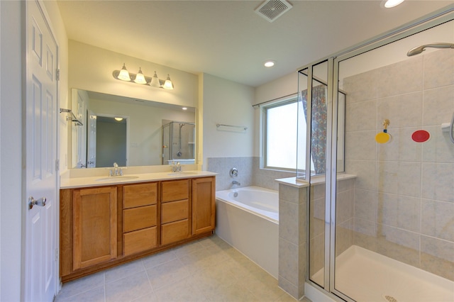 bathroom with vanity, separate shower and tub, and tile patterned floors