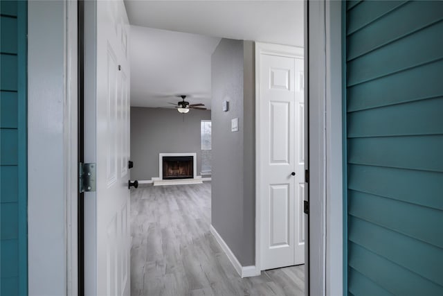 corridor featuring light wood-type flooring