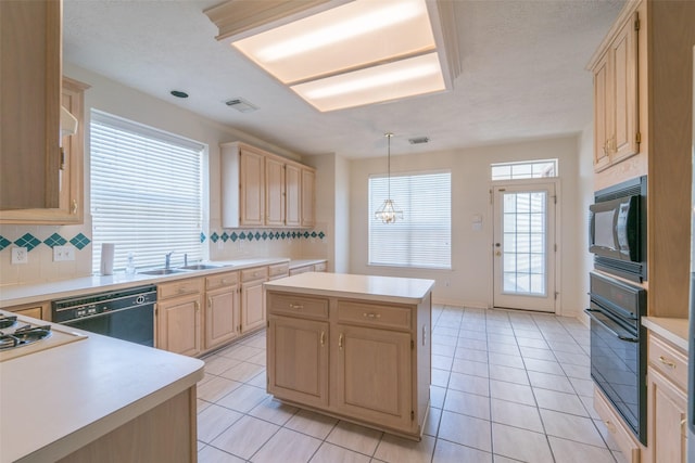 kitchen with a center island, tasteful backsplash, black appliances, light brown cabinetry, and decorative light fixtures