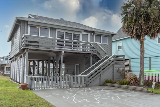 rear view of property with a deck