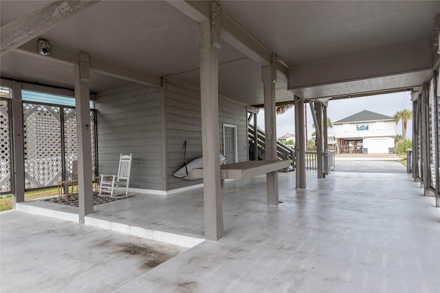 view of patio / terrace featuring a carport