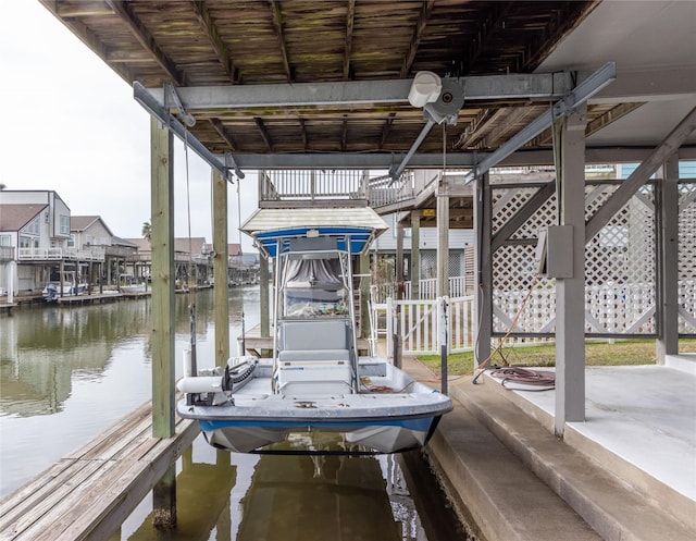 dock area with a water view