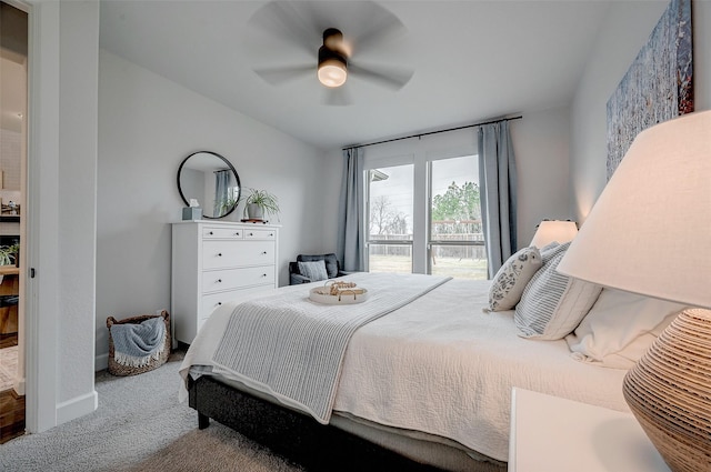 bedroom with ceiling fan, access to outside, and carpet