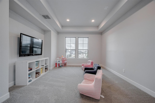 rec room featuring carpet floors, recessed lighting, a raised ceiling, visible vents, and baseboards