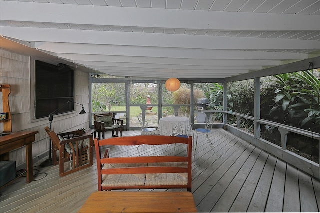 sunroom / solarium with beam ceiling